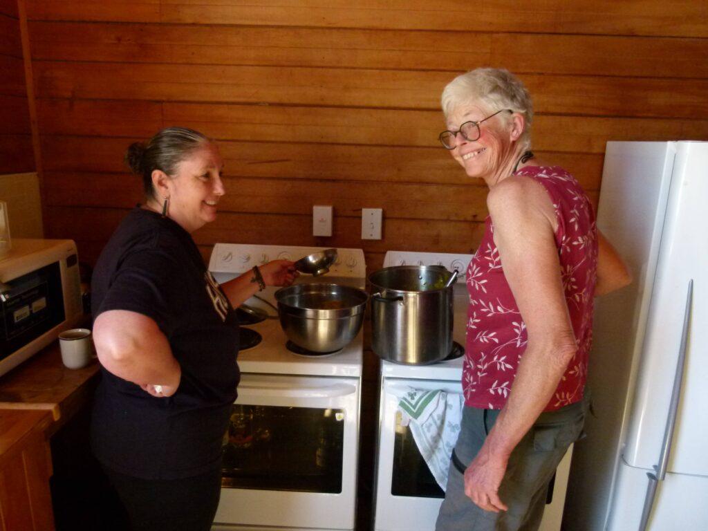Making the sauce together at the stove